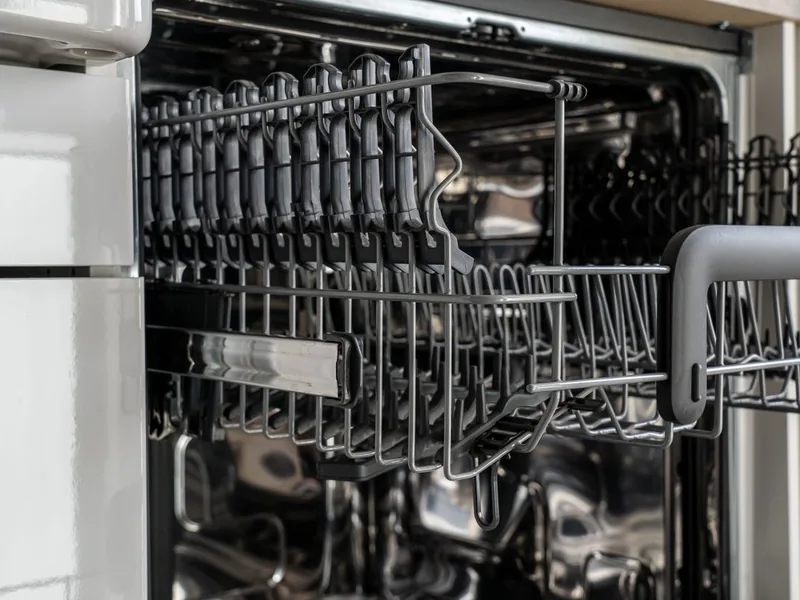Dishwasher interior with its racks visible