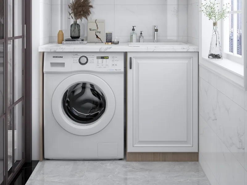 Front-load washing machine in a home laundry room